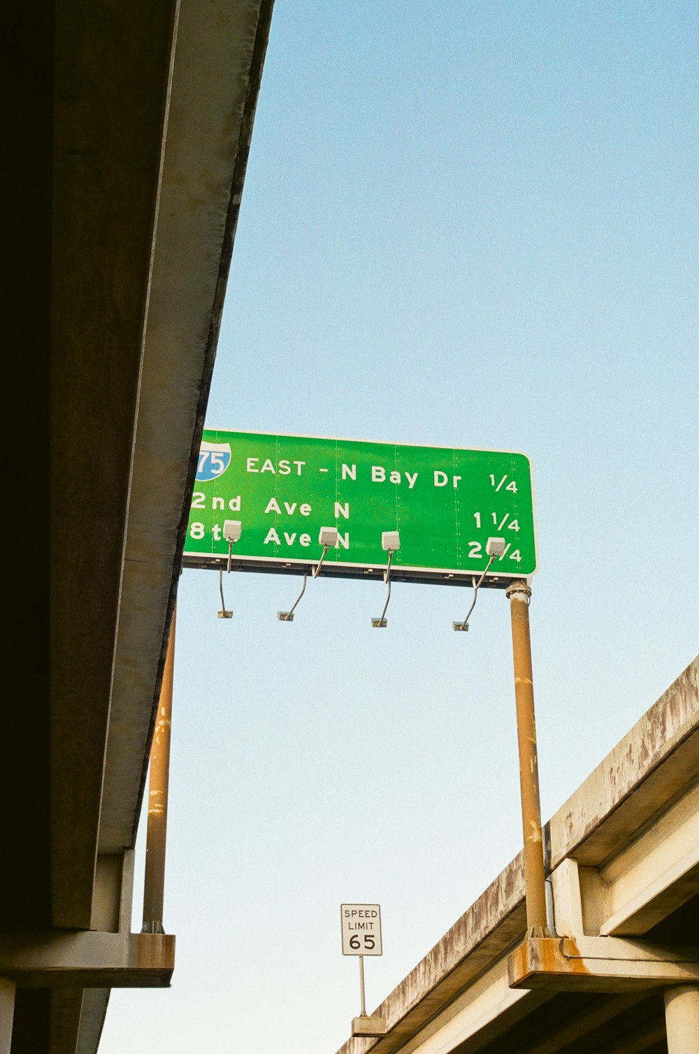 green and white street sign