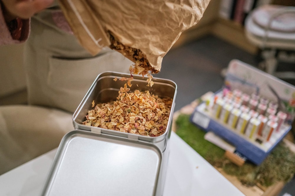 brown food in stainless steel container