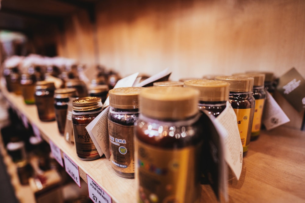 black and brown glass bottles on white table