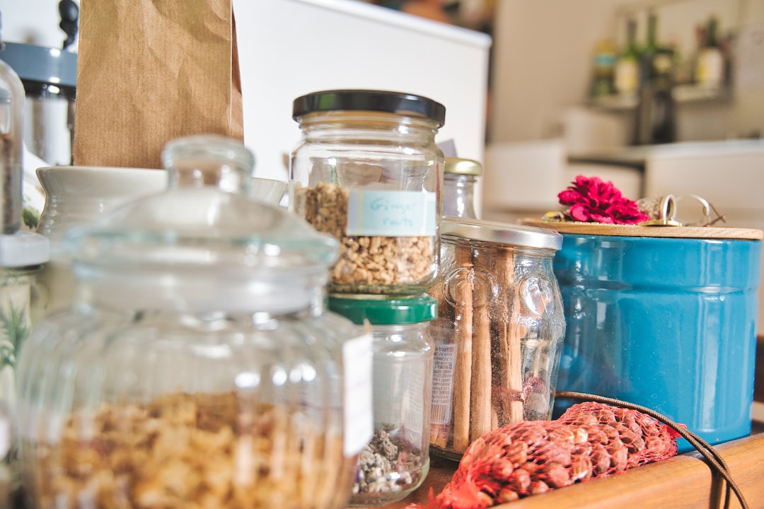 clear glass jars with white and brown food