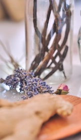 clear glass jar on brown wooden chopping board