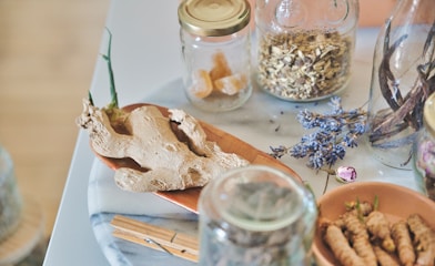 clear glass jar with white powder inside