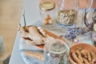 clear glass jar with white powder inside