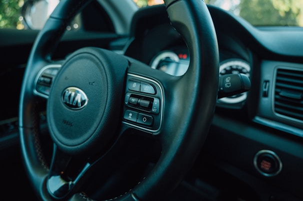 A close-up of a car's interior showcasing the dashboard and controls.