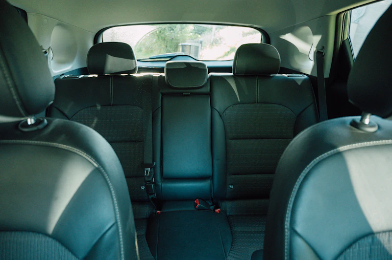 A black leather car seat