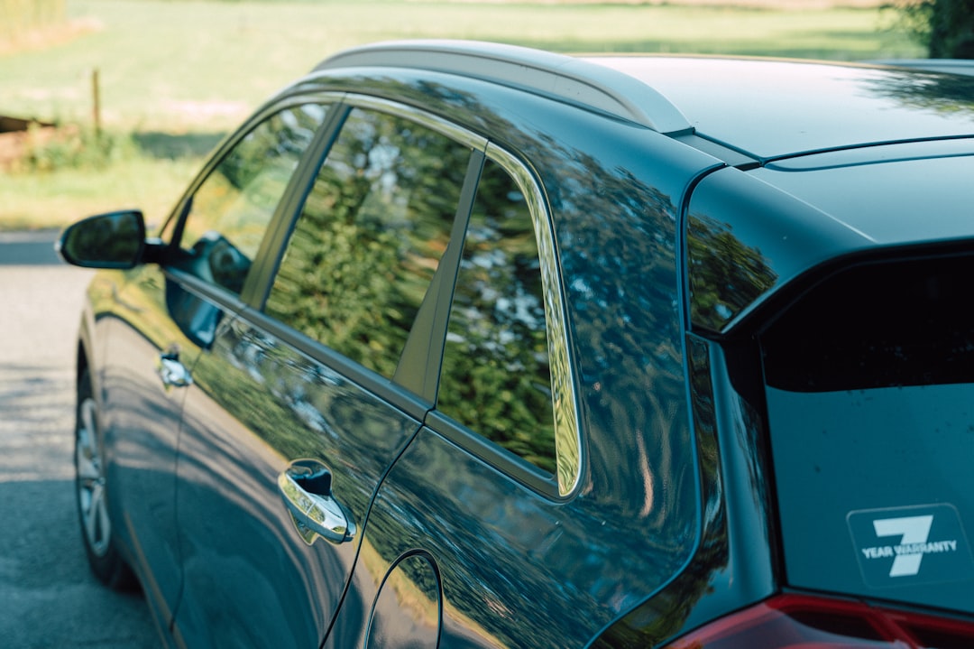 black car with white car door