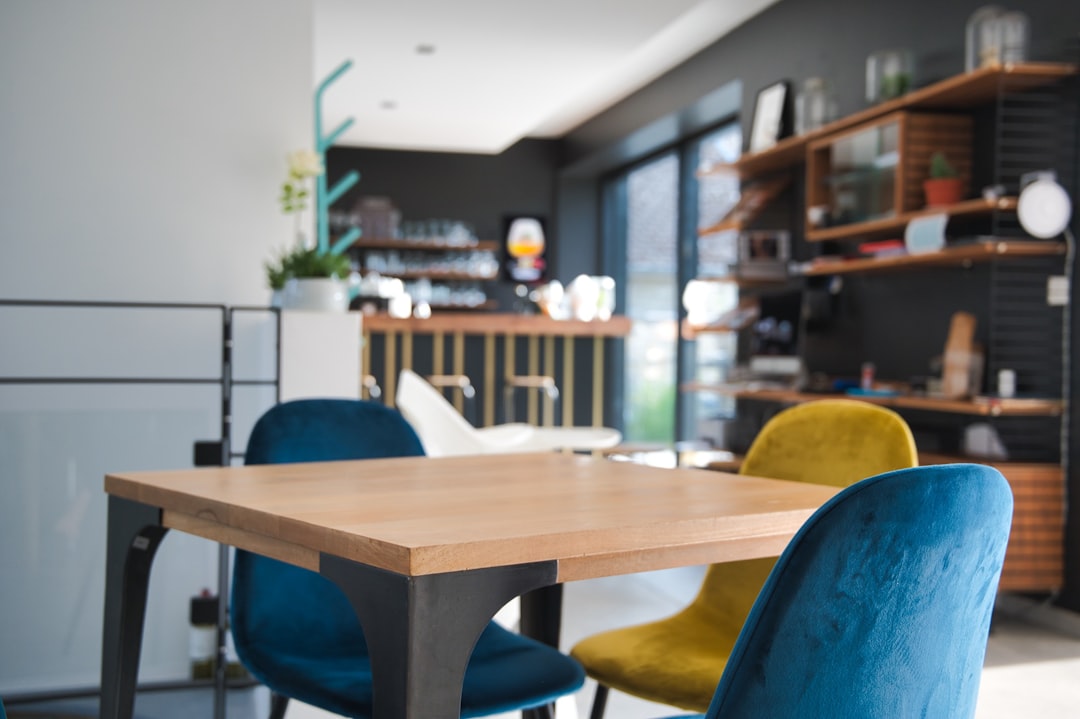 brown wooden table with chairs