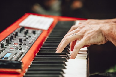 person playing black and white piano