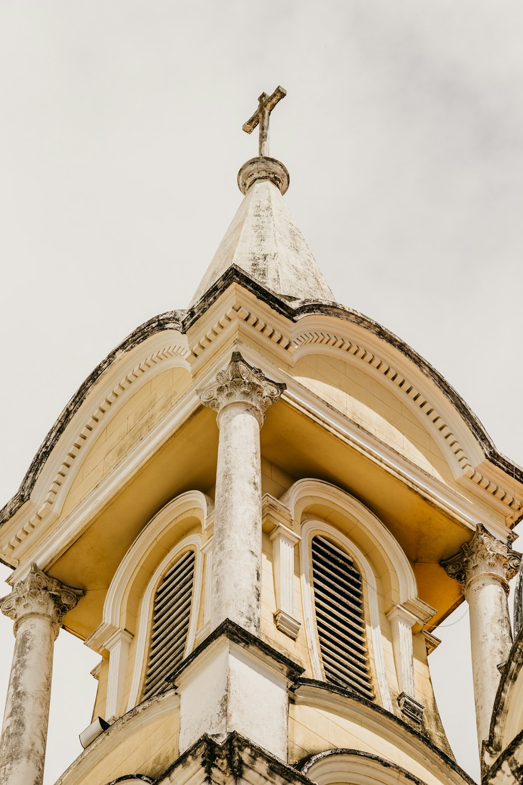 low angle photography of beige concrete building