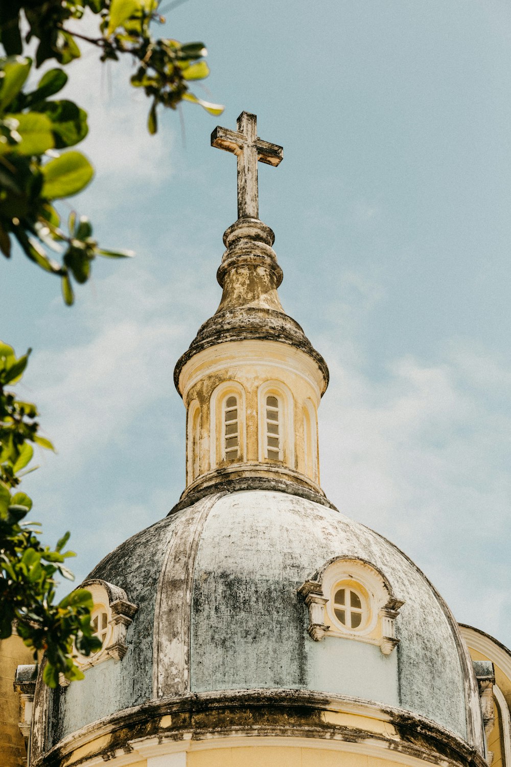 white and gold concrete church under blue sky during daytime