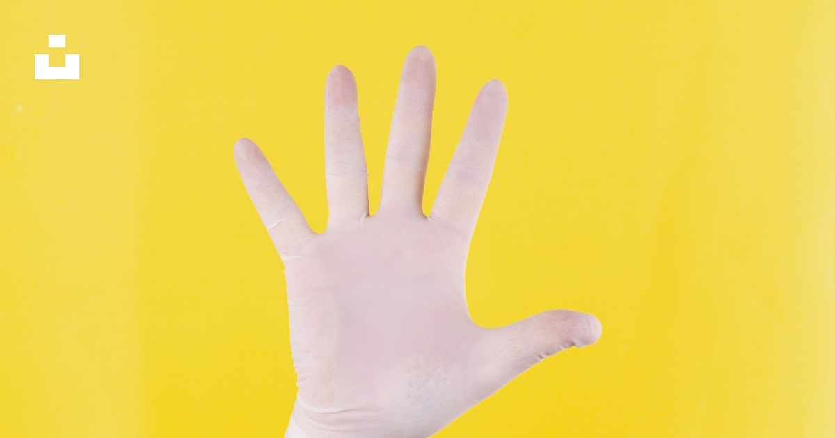 Persons left hand on yellow background photo – Free Hand Image on Unsplash