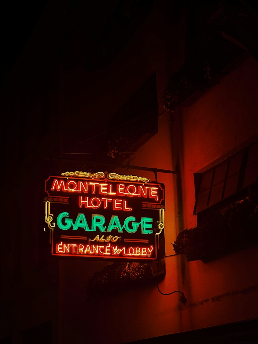 red and white UNKs coffee shop neon signage