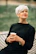 woman in black crew neck shirt holding white ceramic mug
