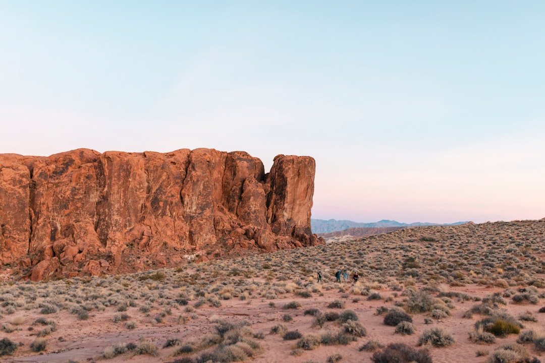 brown rock formation under white sky during daytime