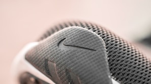 Side view of a javierm boot highlighting the breathable microfiber upper and flyknit technology.