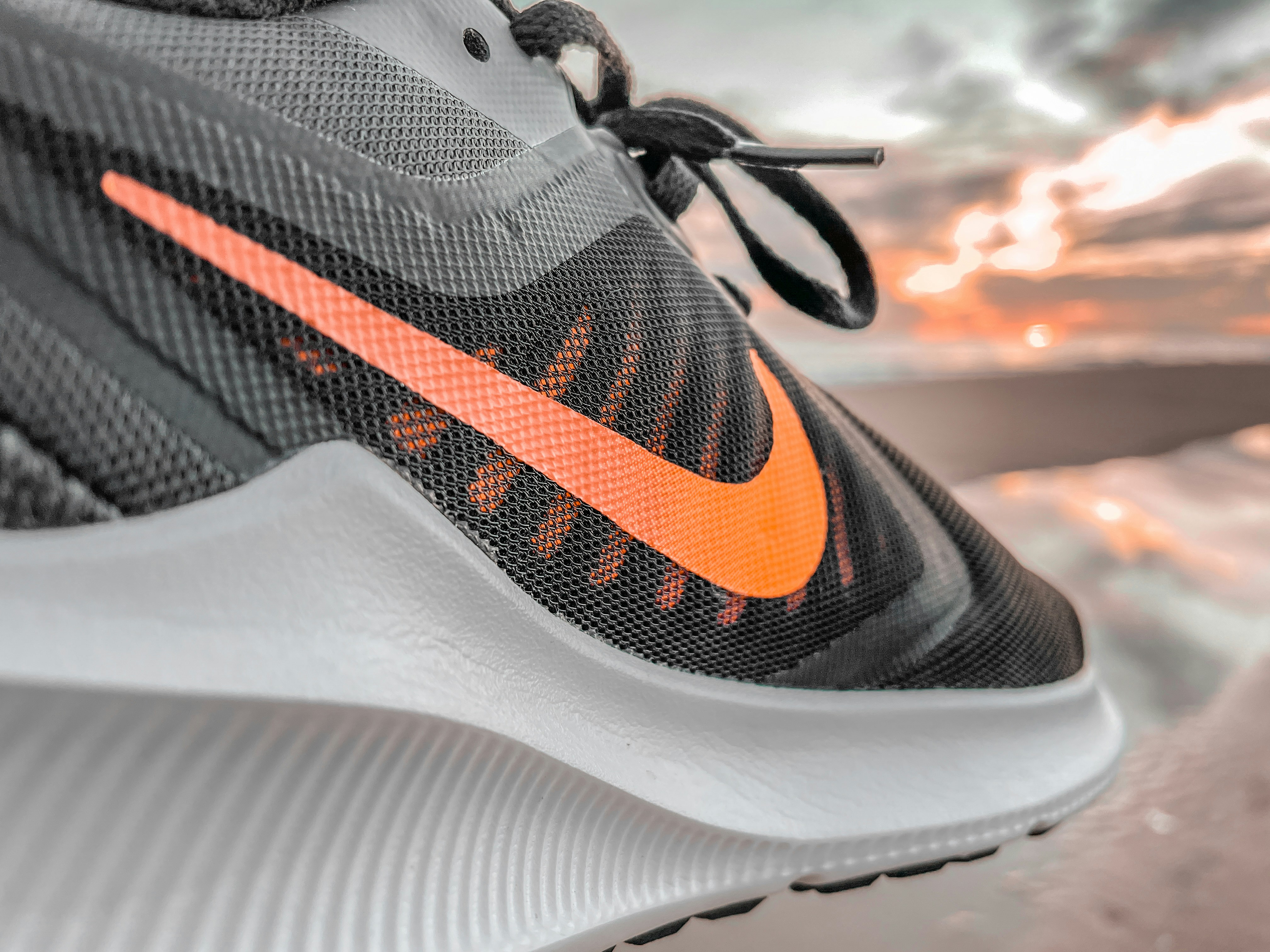 Colourful Nike sneaker toe-cap close-up, soft focus background, product detail shot
