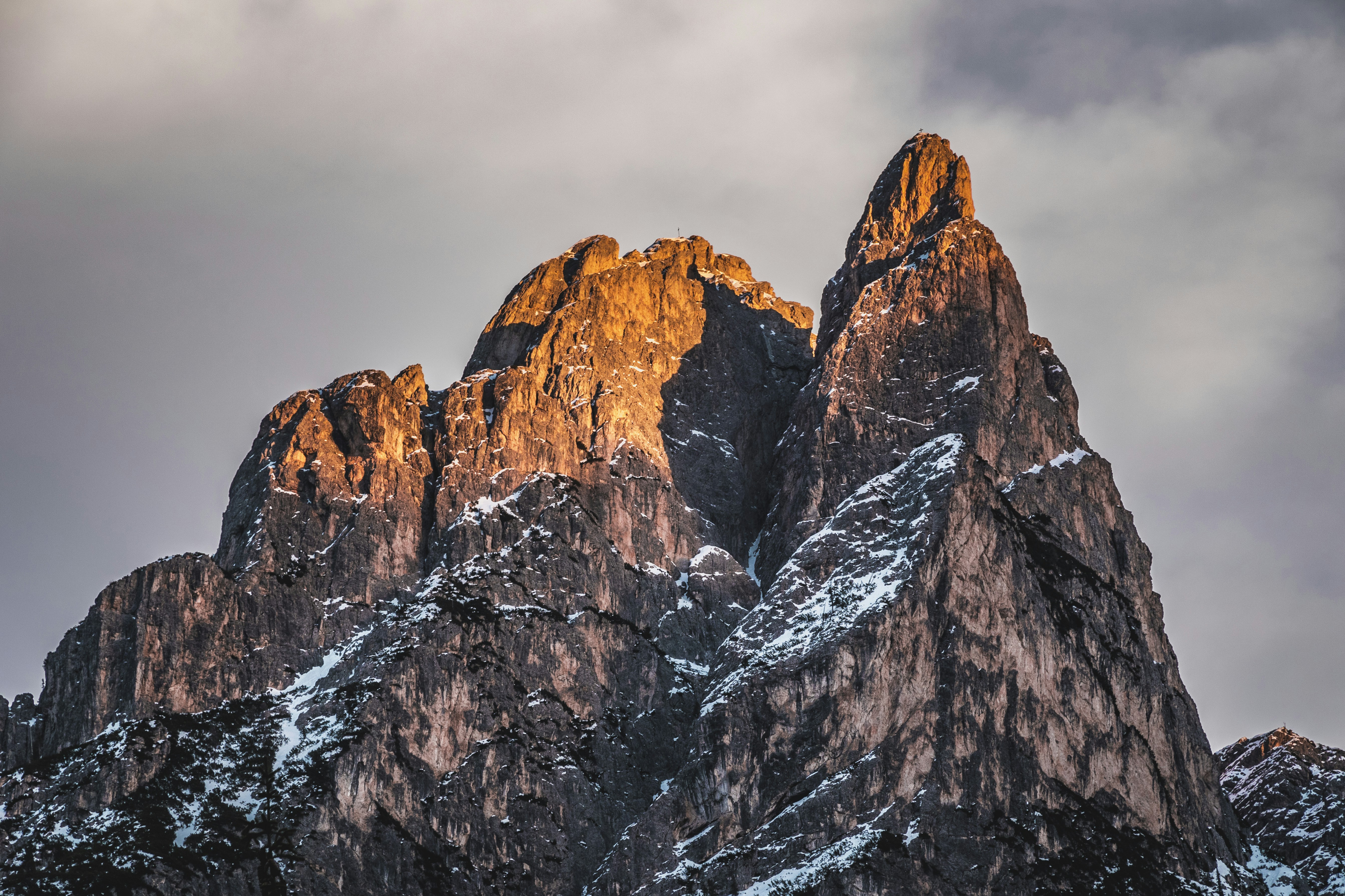 brown rocky mountain under cloudy sky during daytime, 