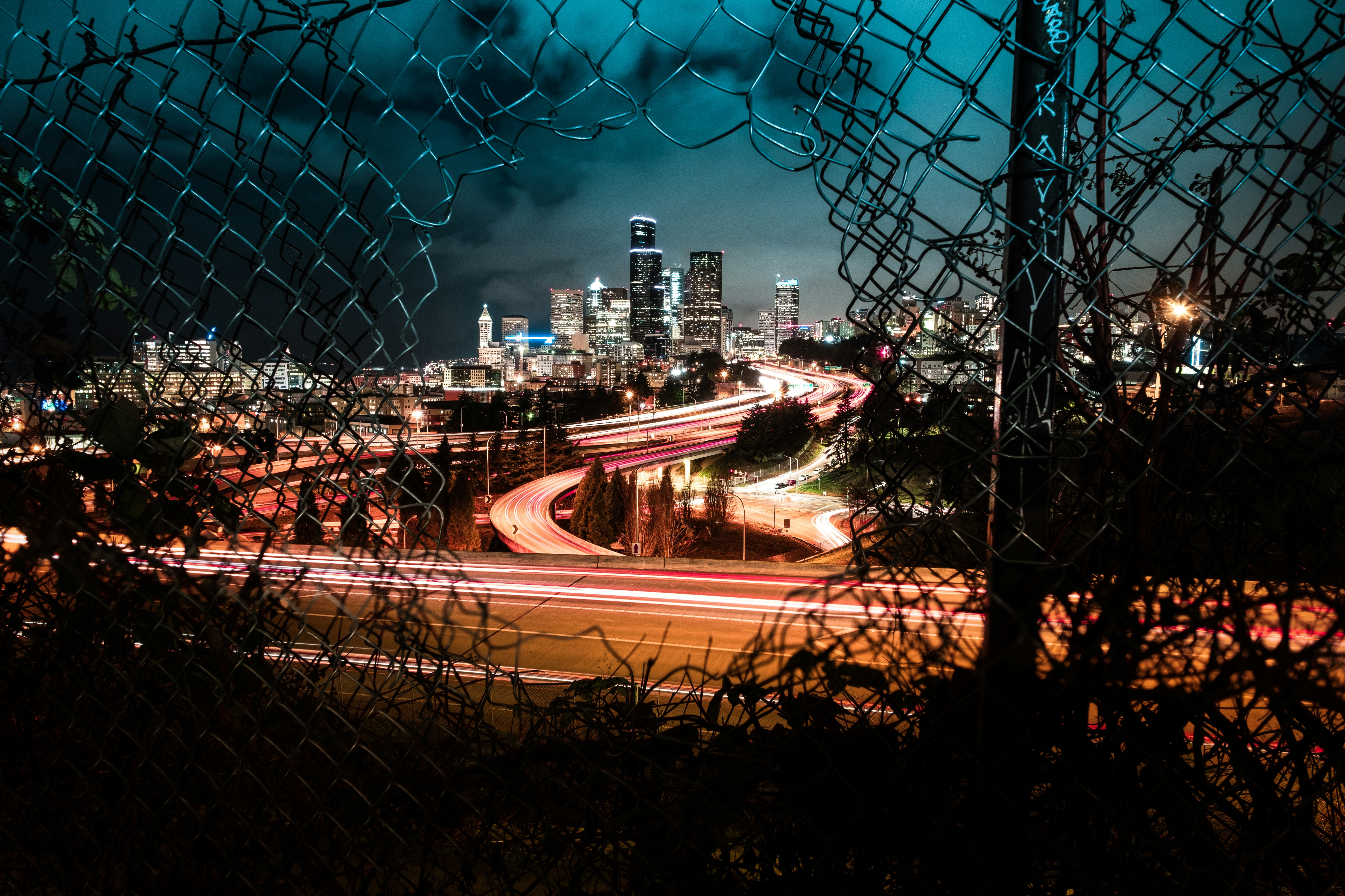 time lapse photography of city lights during night time