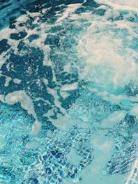 brown and black stone in water