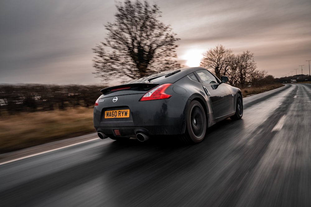 black porsche 911 on road during daytime