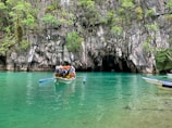 people riding on kayak on river during daytime