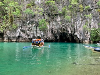 people riding on kayak on river during daytime
