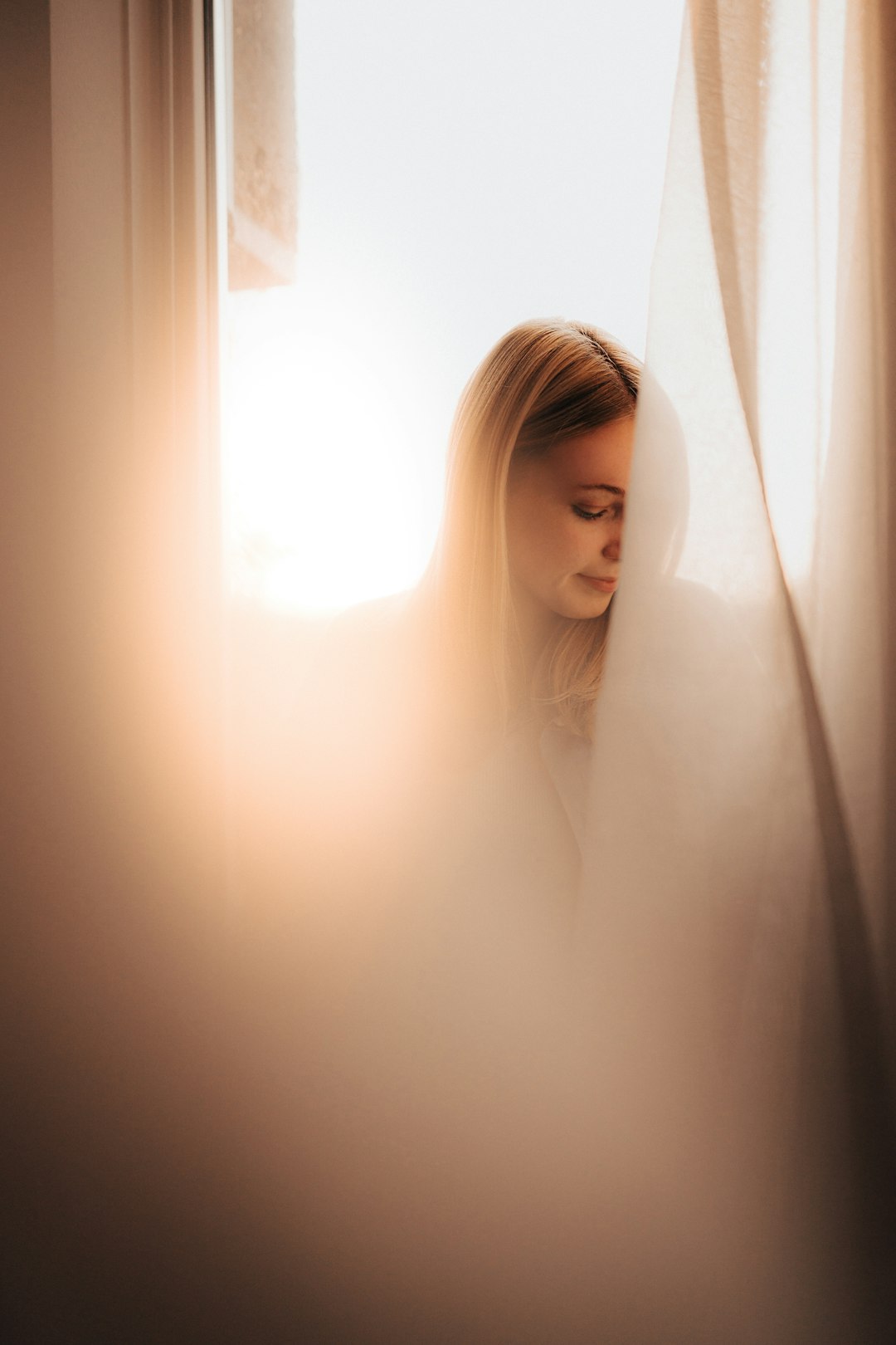 woman in white long sleeve shirt