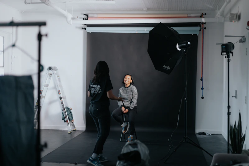 A model in a photo studio with lights