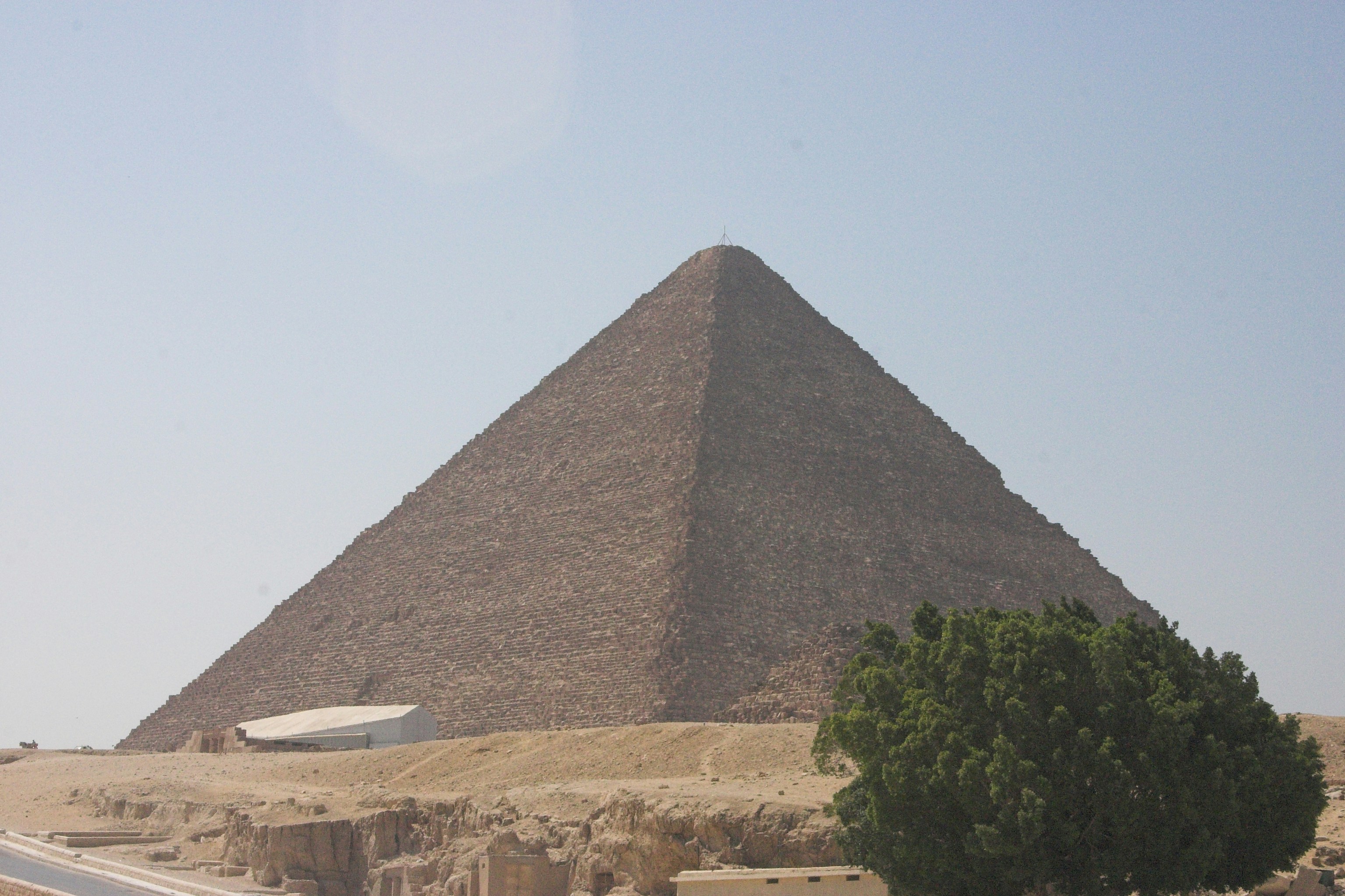 Brown pyramid under blue sky during daytime
