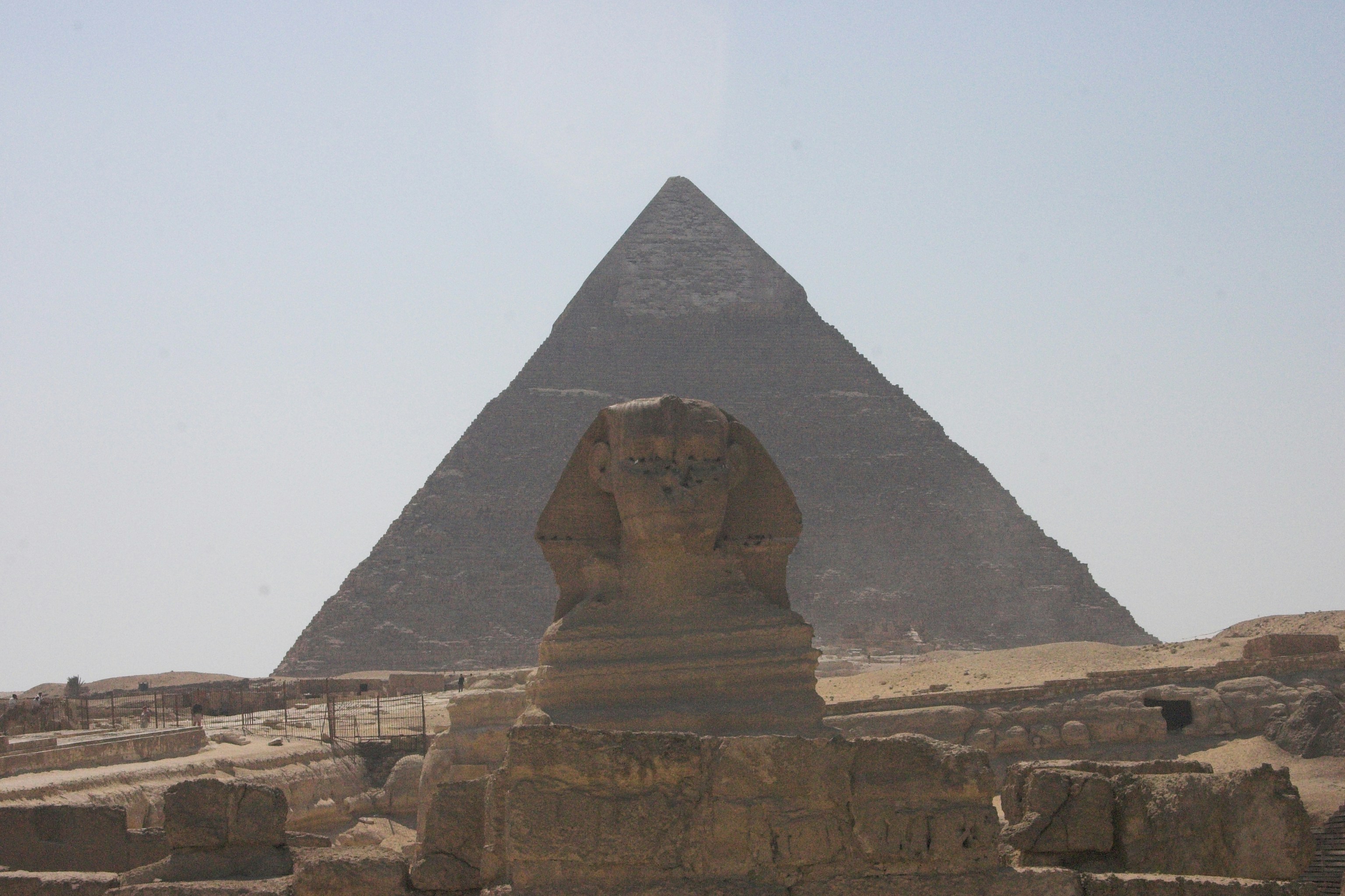 Brown concrete pyramid under white sky during daytime