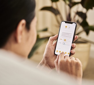 A woman looking at a contract on DocuSign from a iPhone