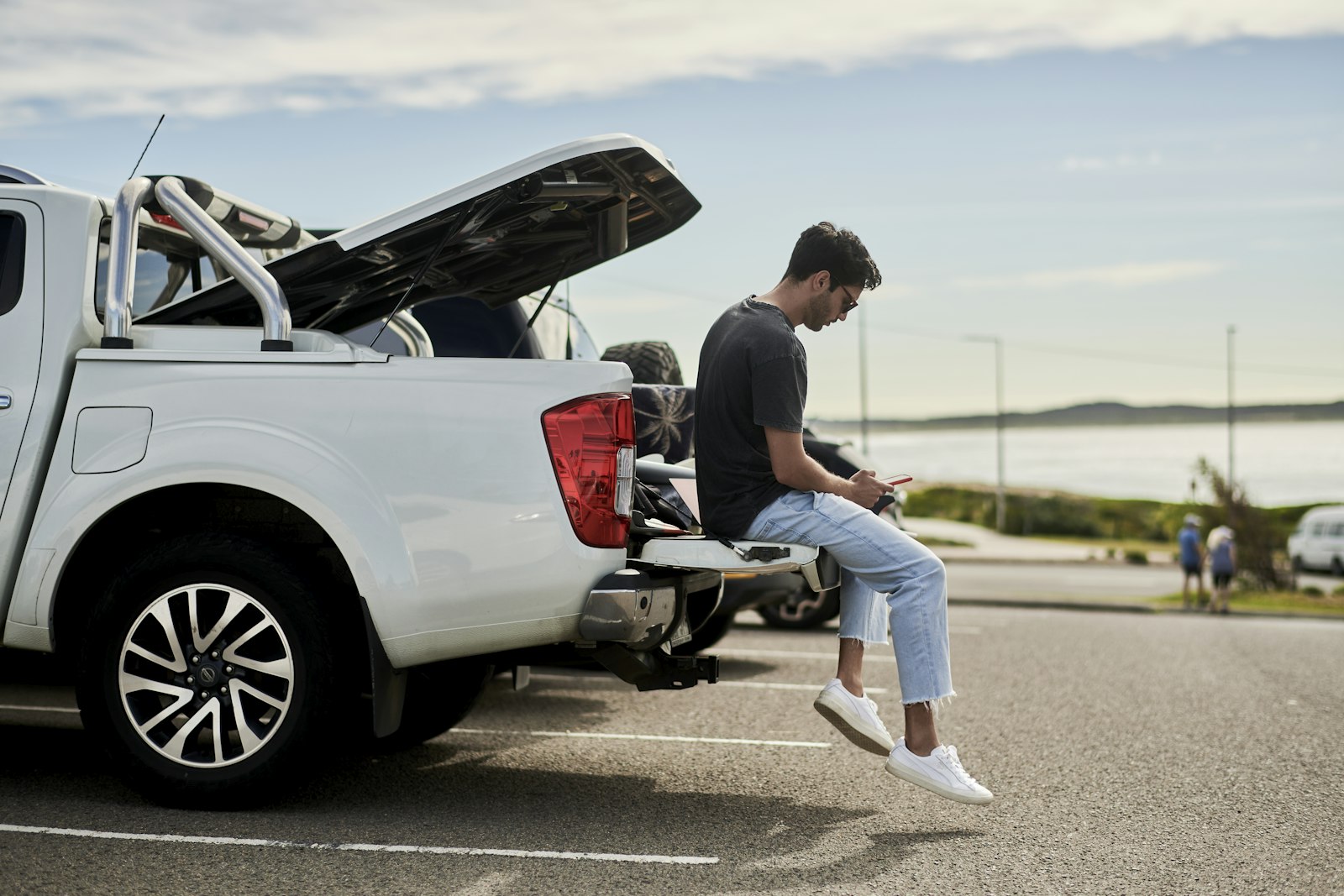 Nikon D850 sample photo. Man sitting on car photography