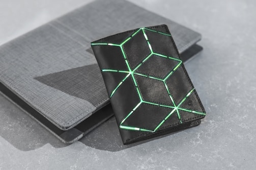 black and green box on black table