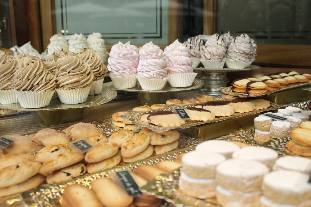 cupcakes on clear glass display counter