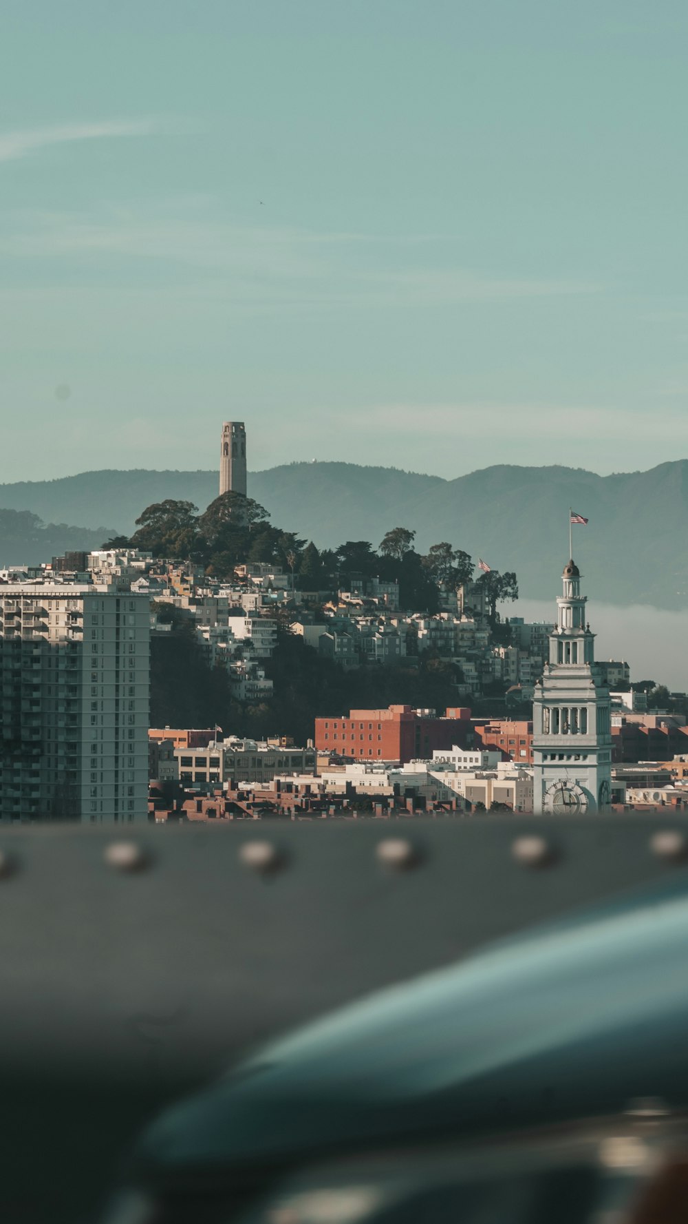 city skyline under blue sky during daytime