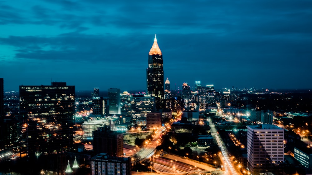 city skyline during night time