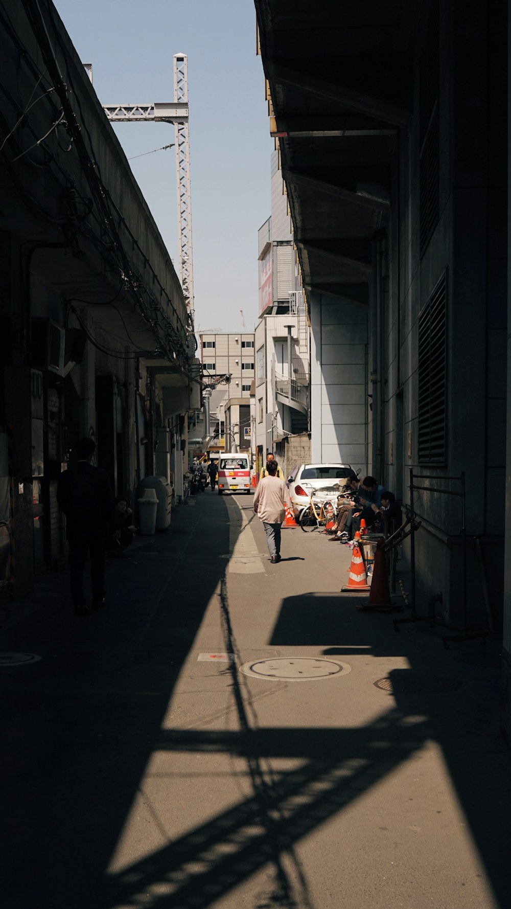 people walking on sidewalk during daytime