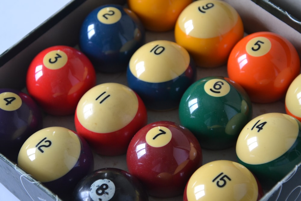 billiard balls on blue surface