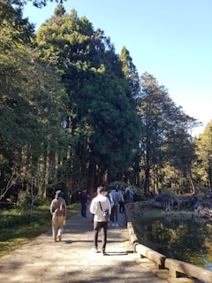 A serene outdoor setting where a small group enjoys a guided mindful tour, reflecting conscious tourism values.