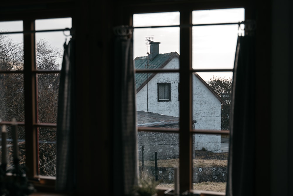 brown wooden framed glass window