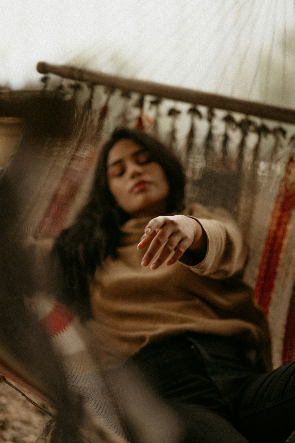 woman in brown long sleeve shirt