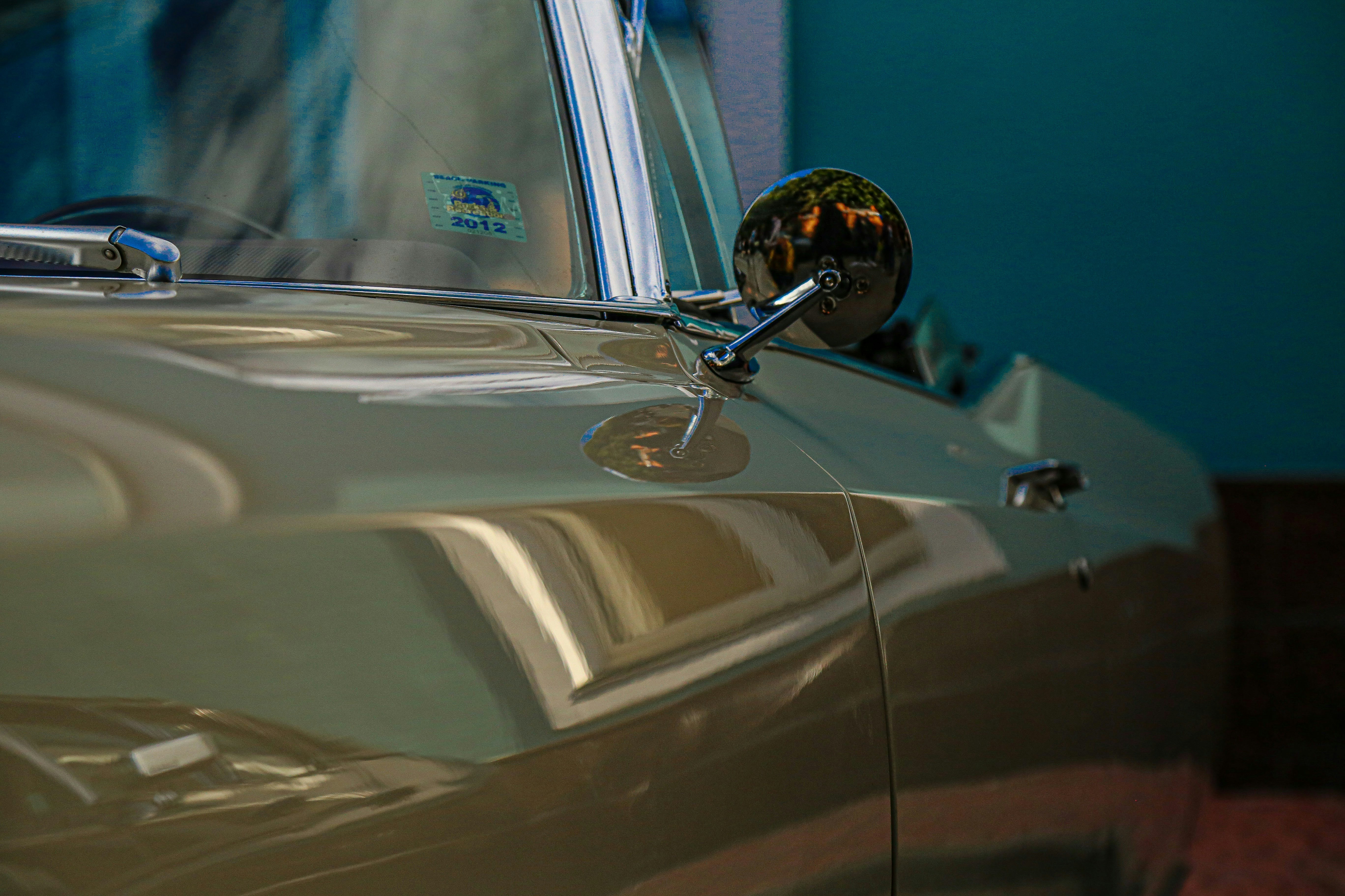 silver car with black steering wheel