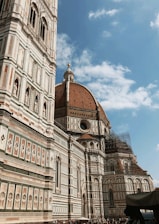 Front view of Catedral Nossa Senhora de Fátima with deep blue sky background.