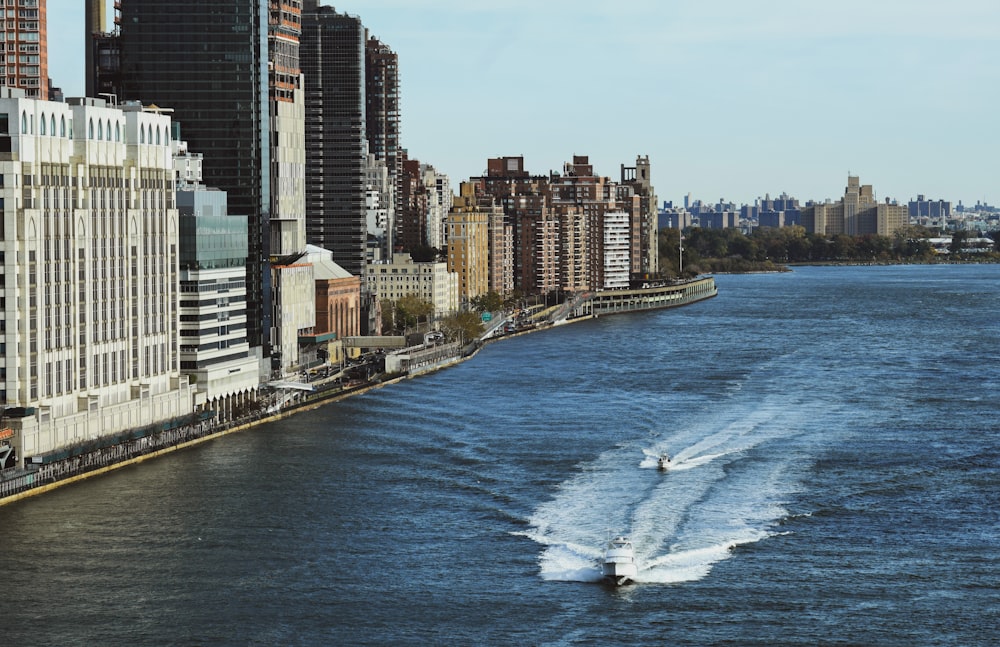 high rise buildings near sea during daytime