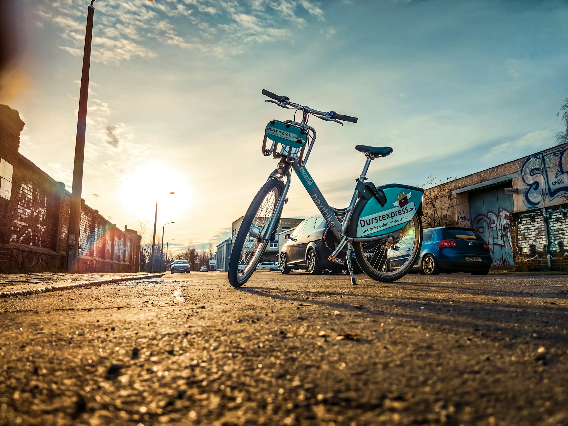 woman wearing yellow long-sleeved dress under white clouds and blue sky during daytime