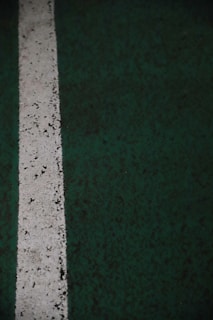 Example of precise floor markings and signage painted on an epoxy resin sports surface.