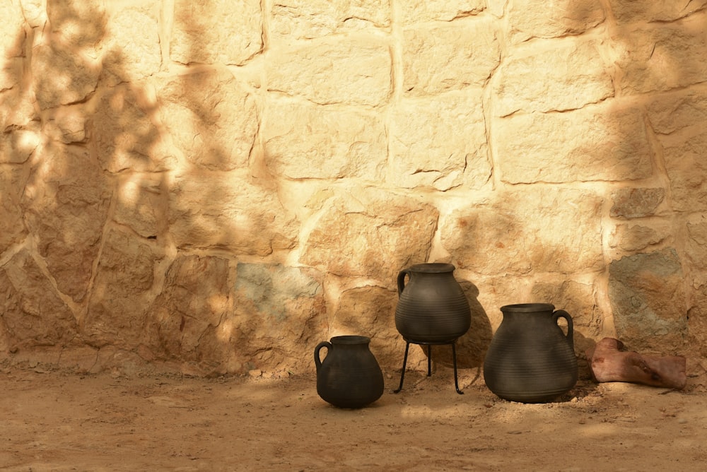 black pot on brown soil