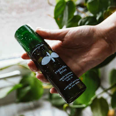 Weight Veda bottle with green and beige ayurvedic natural packaging surrounded by fresh herbs.