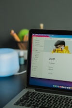black laptop computer turned on displaying facebook