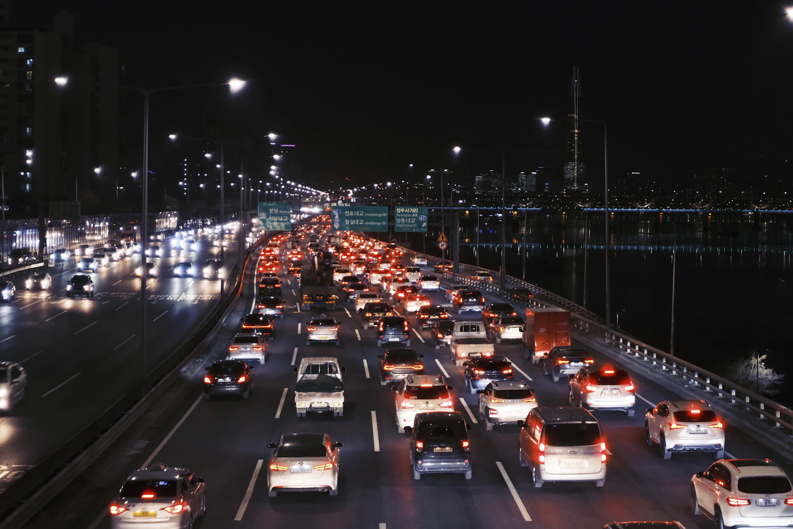 Cars on road during night time
